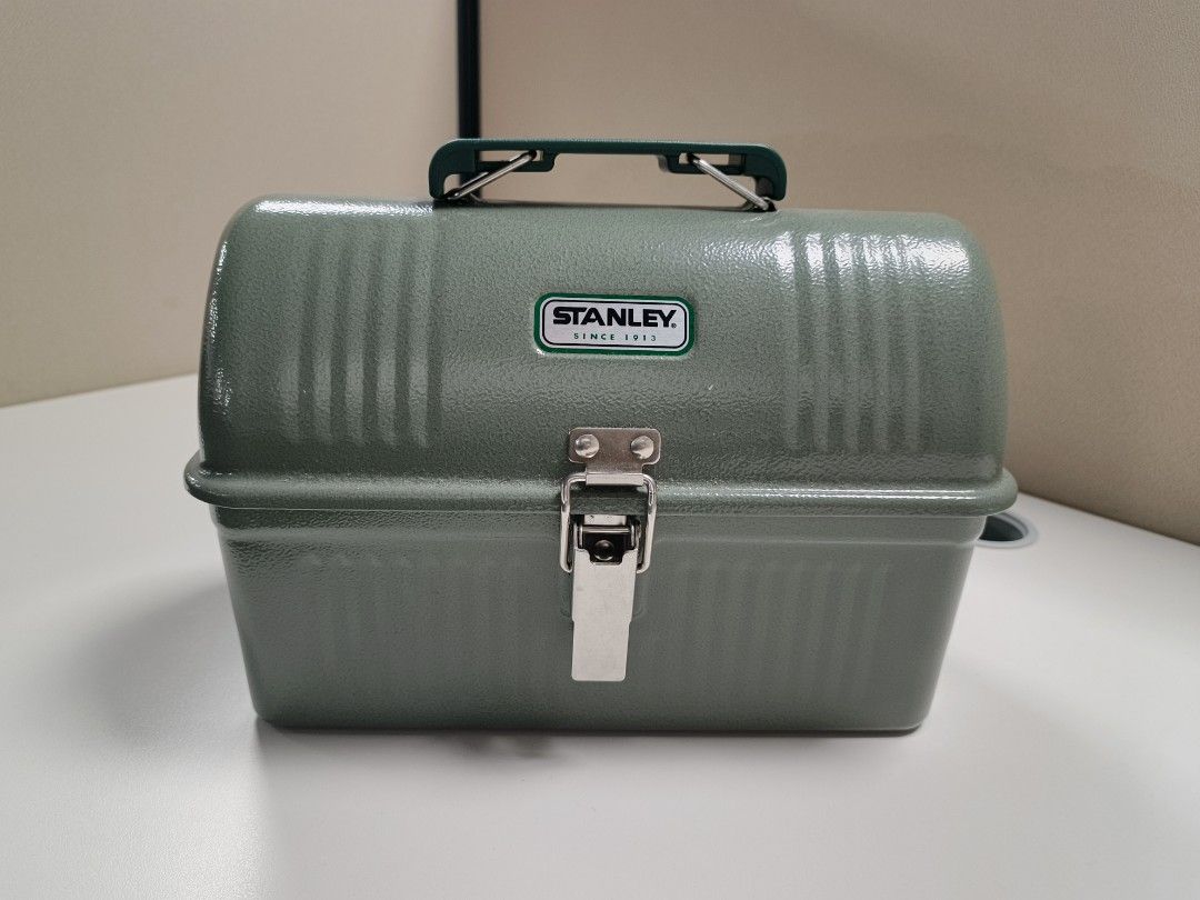 Stanley Classic Lunch Box Green 5.5QT (Category: Food Organization & Storage) located in Quezon City. Submitted by jdonor (Listing ID 1467849191, Image 1). Description: - Authentic Stanley Classic Lunch Box in signature green - Durable steel construction with a secure latch closure and sturdy metal handle - Generous 5.5-quart (5.2L) capacity with a classic domed top - Clean interior, ready for daily use - Features official Stanley branding and ca