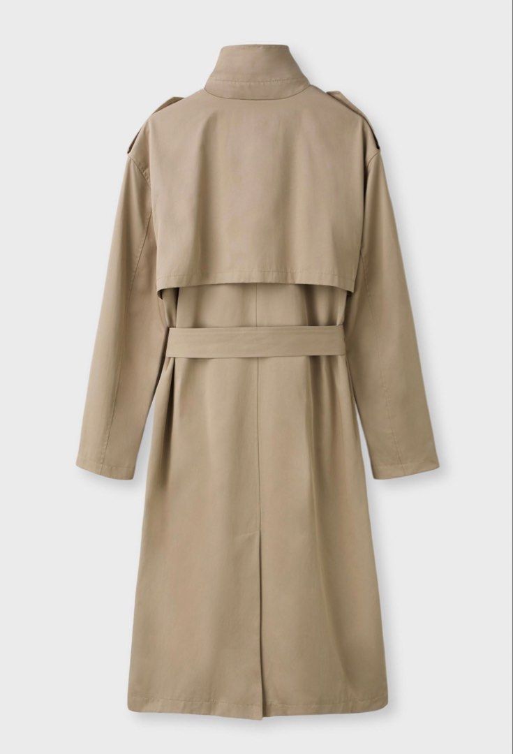 Stradivarius Beige Long Trench Coat (Category: Coats, Jackets and Outerwear) located in Manila. Submitted by cleanelle_closet (Listing ID 1467932993, Image 2). Description: Selling my Stradivarius trench coat in beige. * Condition: Brand new, never worn * With original tag * Color: Beige * Original price: ₱3,395 Bought it but never got the chance to wear it, so letting it go to someone who can use it..