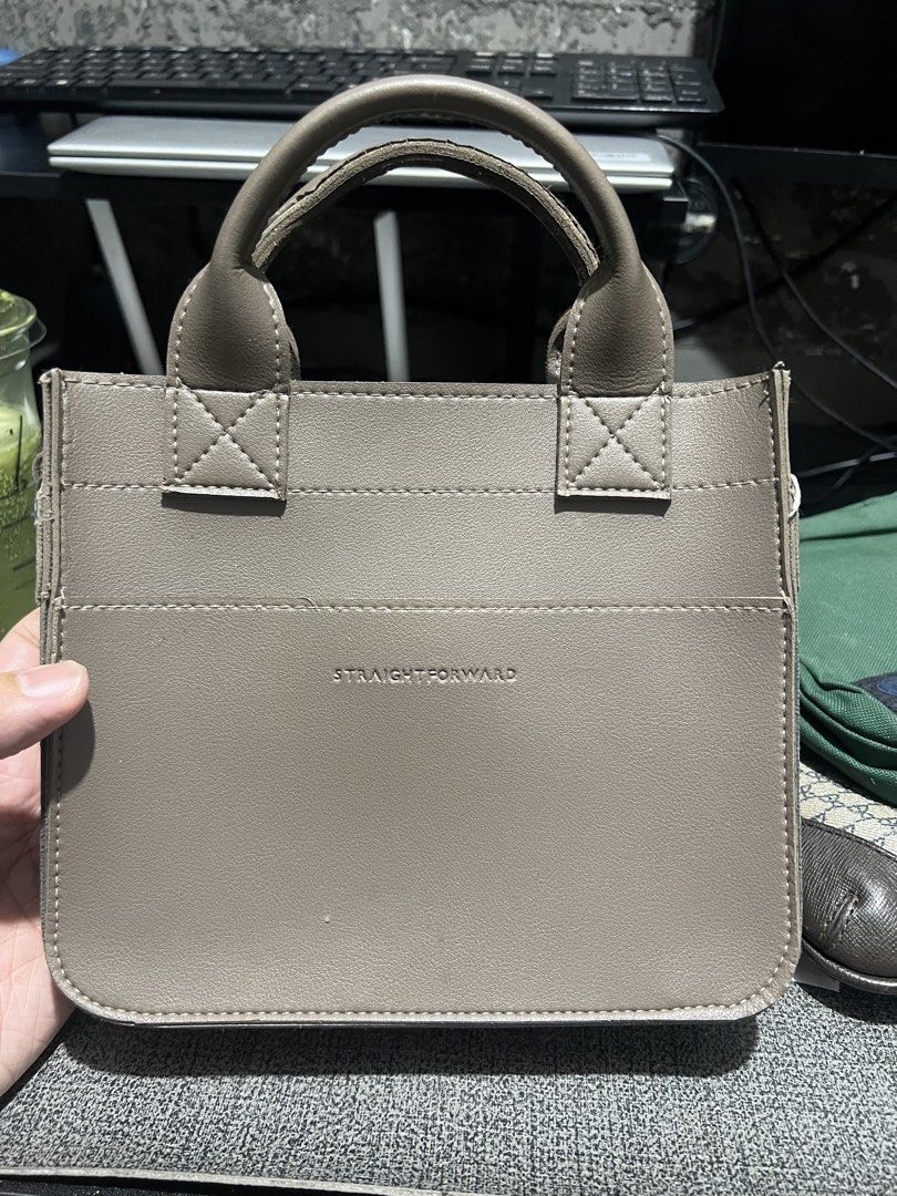 Straightforward Sling Bag (Category: Sling Bags) located in Manila. Submitted by declutterbyron (Listing ID 1467866507, Image 1). Description: Comes with strap Well used item Can meet around BGC.