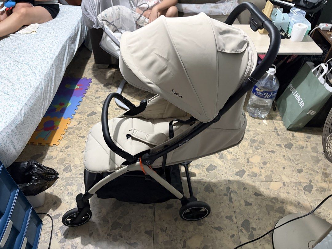 Sugar Baby Autofold Stroller Cream (Category: Strollers) located in Caloocan City. Submitted by allensumag62992 (Listing ID 1468050619, Image 3). Description: - Brand: Sugar Baby - Color: Cream - Condition: Excellent, clean fabric, works smoothly with no issues - Autofold lightweight frame - Smooth-rolling wheels - Large storage basket underneath - Padded seat harness for maximum safety - Protective canopy against sun and wind.