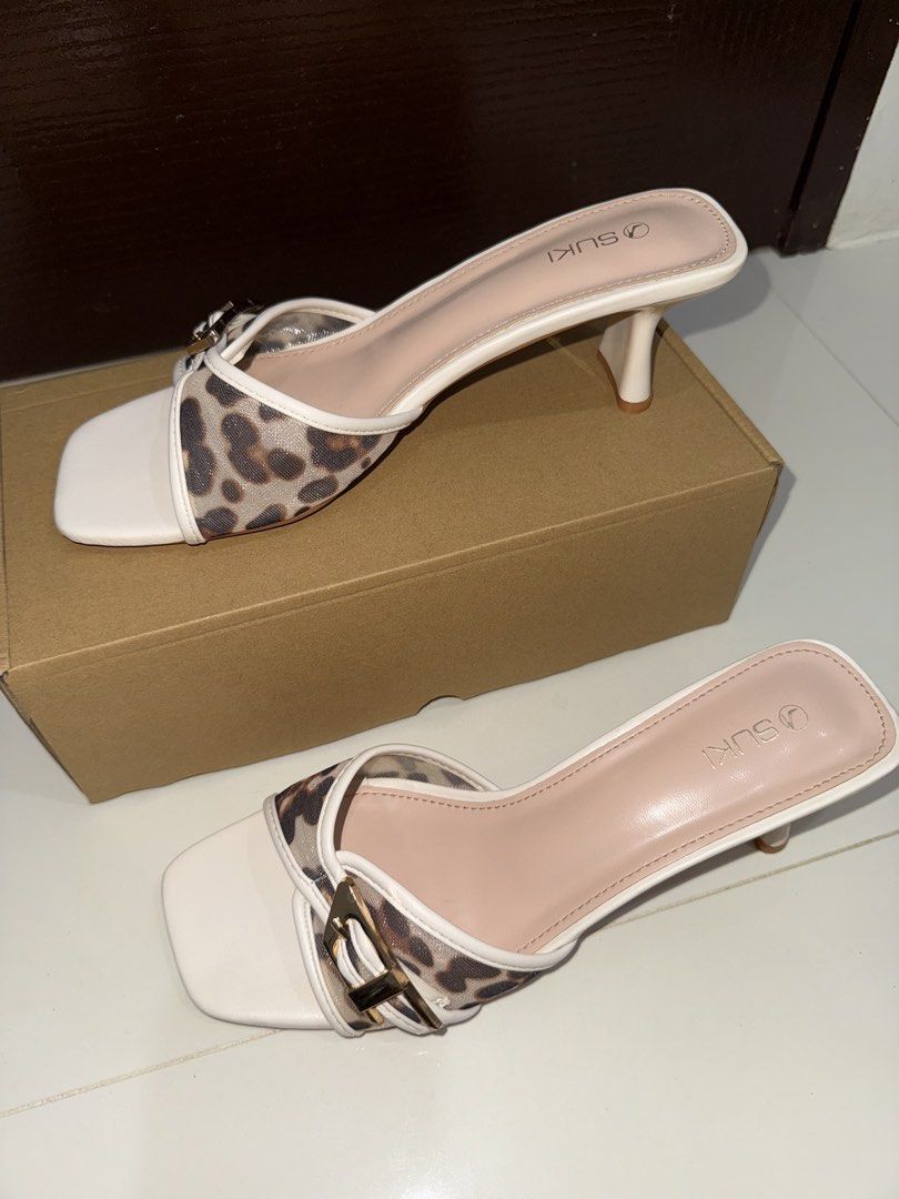 Suki Animal Print Mid-Height Heels (Category: Heels) located in Davao. Submitted by evrgela (Listing ID 1467955756, Image 2). Description: Suki Animal Print Mid-Height Heels PRICE: ₱850 (ORIG PRICE: ₱1,299) SIZE: 39 CONDITION: Worn twice outside only. Pristine condition. RFS: Not my style anymore.