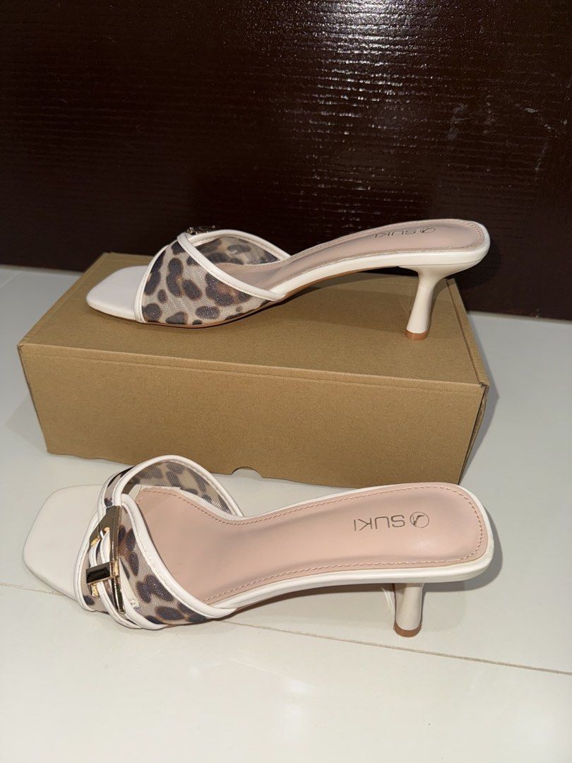 Suki Animal Print Mid-Height Heels (Category: Heels) located in Davao. Submitted by evrgela (Listing ID 1467955756, Image 1). Description: Suki Animal Print Mid-Height Heels PRICE: ₱850 (ORIG PRICE: ₱1,299) SIZE: 39 CONDITION: Worn twice outside only. Pristine condition. RFS: Not my style anymore.