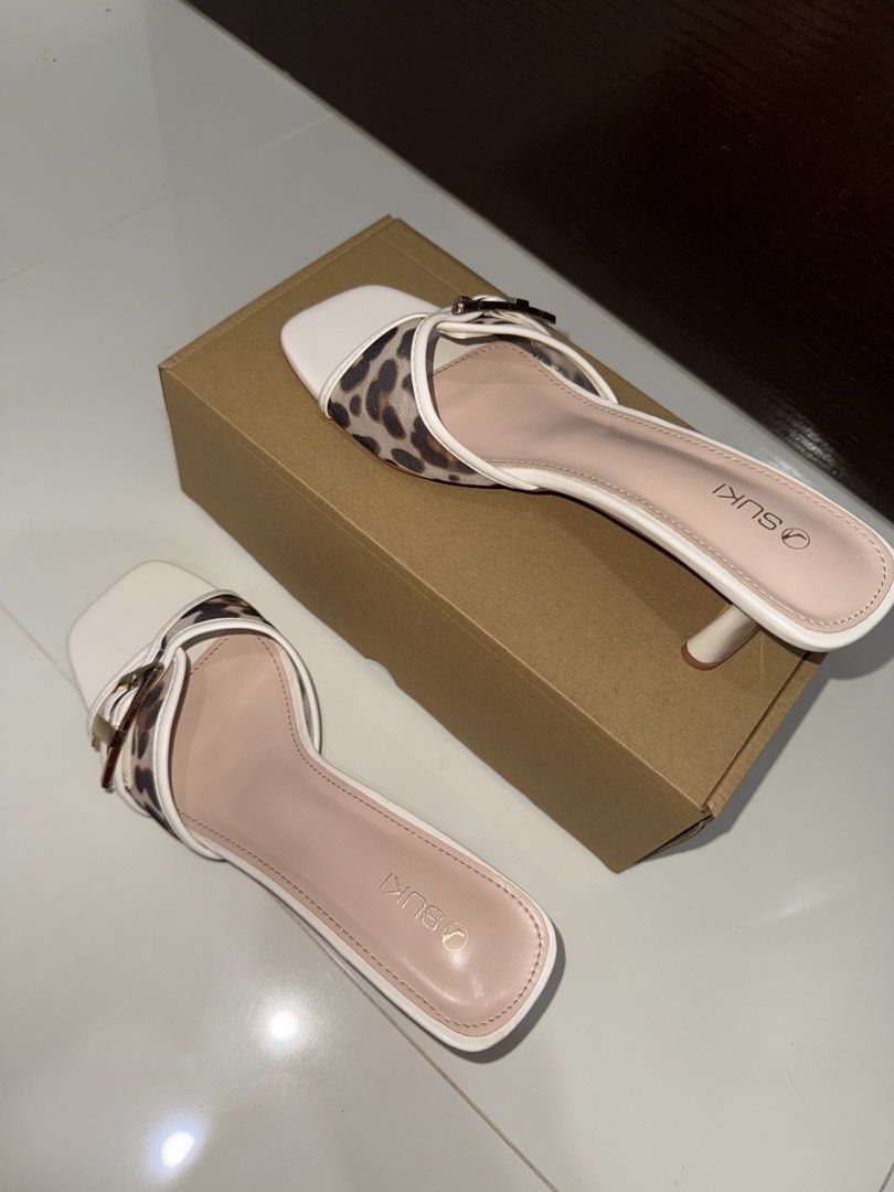 Suki Animal Print Mid-Height Heels (Category: Heels) located in Davao. Submitted by evrgela (Listing ID 1467955756, Image 3). Description: Suki Animal Print Mid-Height Heels PRICE: ₱850 (ORIG PRICE: ₱1,299) SIZE: 39 CONDITION: Worn twice outside only. Pristine condition. RFS: Not my style anymore.