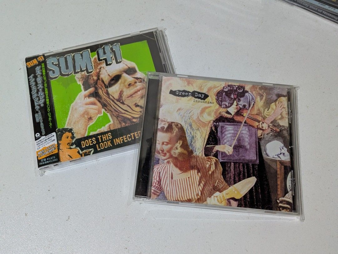 sum 41 / green day CD (Category: CDs & DVDs) located in Quezon City. Submitted by itsluisyall (Listing ID 1468016679, Image 1). Description: sum 41 vg+ japan with obi green day vg+ 300 each.