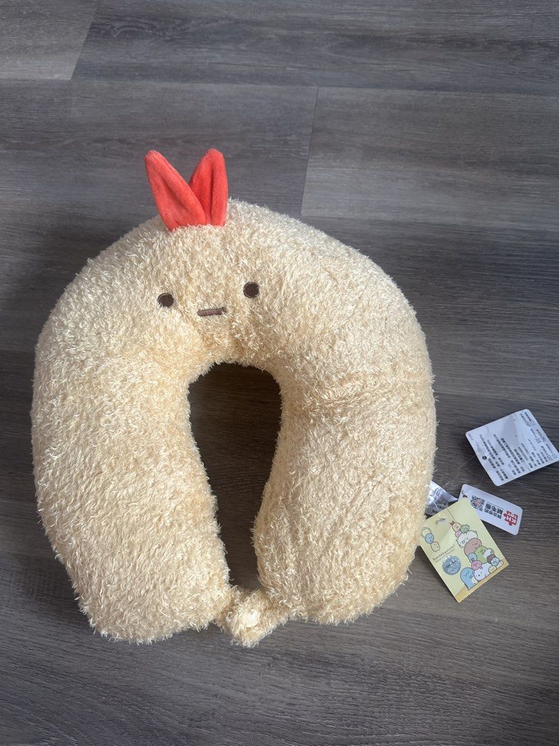 Sumikko Gurashi Fried Shrimp Tail Neck Pillow (Category: Plushies & Soft Toys) located in Cainta. Submitted by shopbyyna (Listing ID 1467894682, Image 1). Description: - 100% Authentic San-X Sumikko Gurashi merchandise - Super soft plush fabric with adorable fried shrimp tail detail - Brand new with original tags, including KH Toy tag and San-X hologram sticker - Ideal for travel, road trips, naps, or cozy lounging at home - Ships securely from a