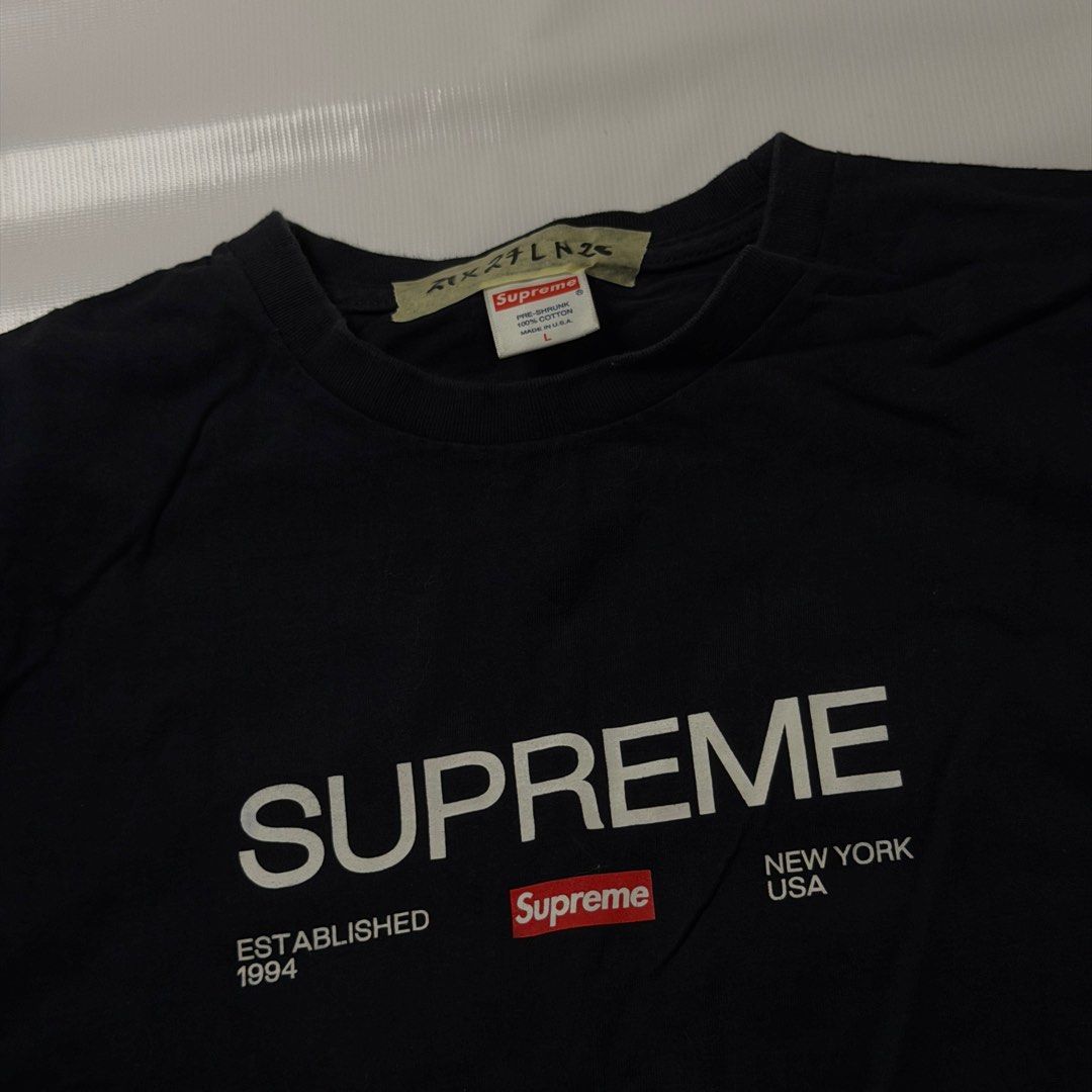 Supreme Established 1994 Black T-Shirt (Category: Tshirts & Polo Shirts ) located in Gapan. Submitted by rasthriftshop17 (Listing ID 1468007277, Image 2). Description: SUPREME Size on tag: L Dimes: 21 x 27 ₱750 + sf Condition: Excellent Color rate: 9/10 Issue: None.