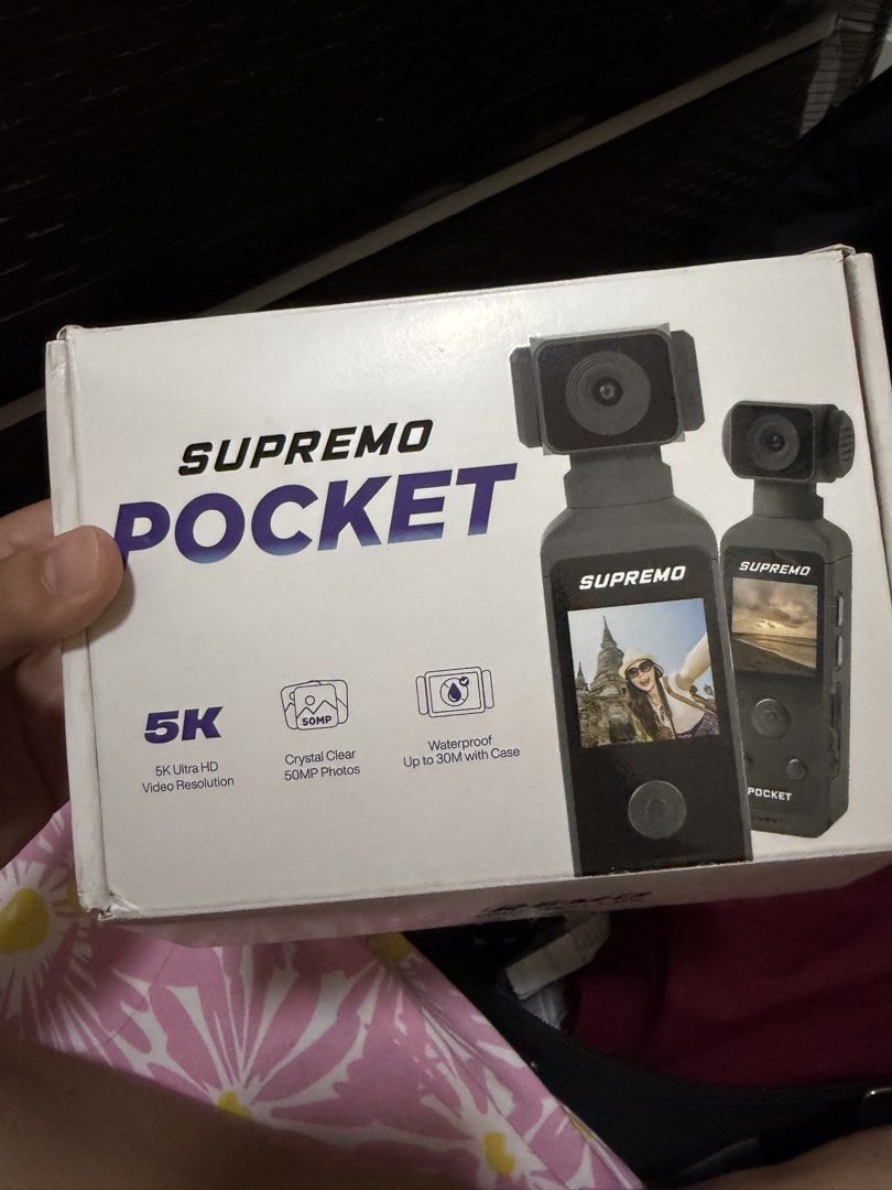 Supremo Pocket 5K Handheld Gimbal Camera (Category: Cameras) located in Makati City. Submitted by cathymars13 (Listing ID 1468057421, Image 1). Description: - Model: Supremo Pocket 5K Handheld Gimbal Camera (Black) - Quality: Shoots stunning 5K video and 50MP photos - Condition: Tested and powers on successfully - Features: Built-in screen, control buttons, and wrist strap - Extras: Includes original retail box and 30M waterproof casing - Ideal f