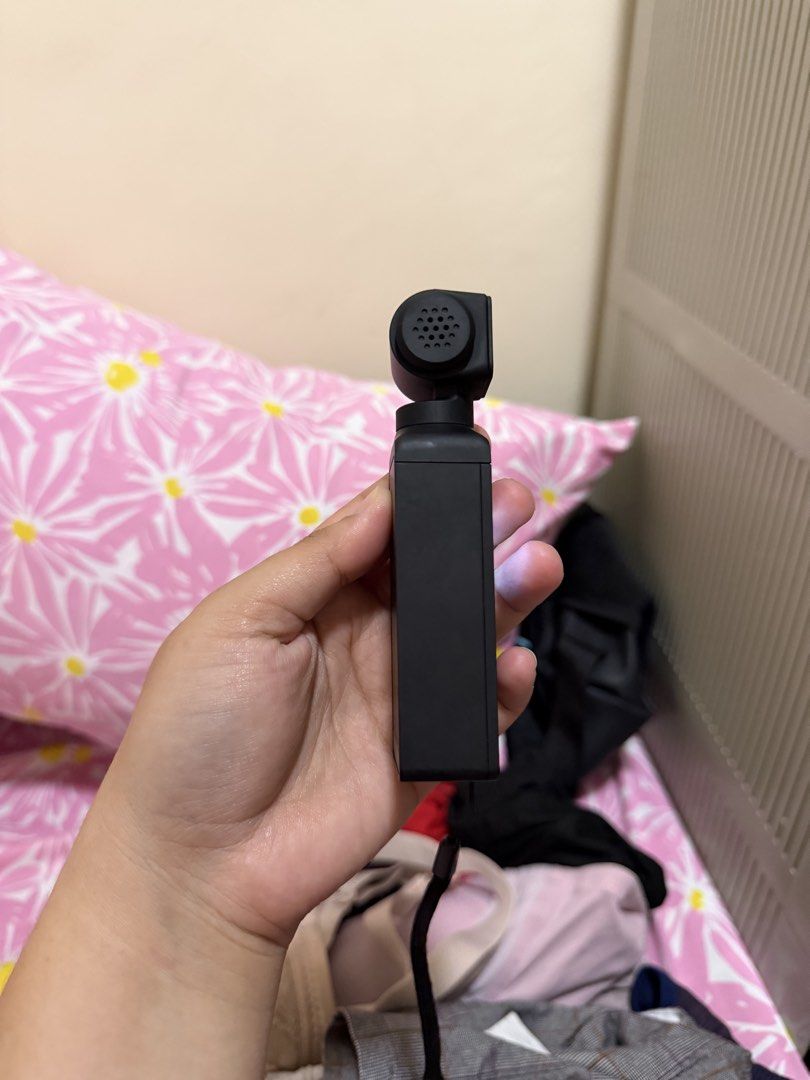 Supremo Pocket 5K Handheld Gimbal Camera (Category: Cameras) located in Makati City. Submitted by cathymars13 (Listing ID 1468057421, Image 3). Description: - Model: Supremo Pocket 5K Handheld Gimbal Camera (Black) - Quality: Shoots stunning 5K video and 50MP photos - Condition: Tested and powers on successfully - Features: Built-in screen, control buttons, and wrist strap - Extras: Includes original retail box and 30M waterproof casing - Ideal f