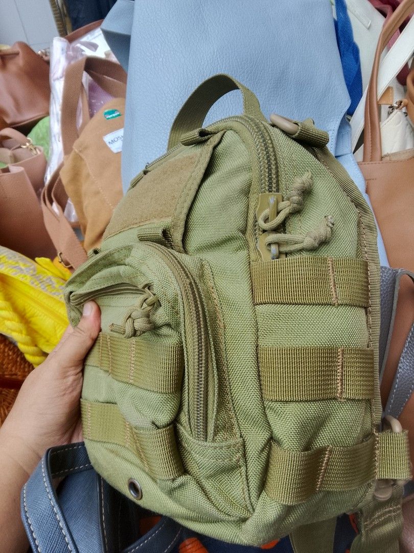 TACTICAL BAG (Category: Sling Bags) located in Naga. Submitted by choythrift (Listing ID 1467856029, Image 2). Description: For her/him 👧🏻🧒🏻 TACTICAL BAG 9/10 excellent condition 9/10 color rate Plus shipping fee Courier: J and t, flash express Drop off: Urban Chicc Location: Naga City, Bicol📍 📩.