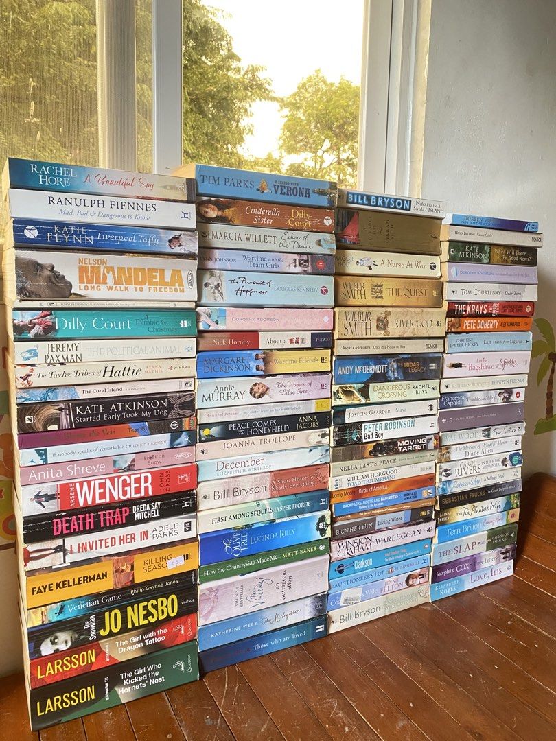 TAKE ALL (Category: Storybooks) located in Quezon City. Submitted by donagraceliwanag (Listing ID 1467881506, Image 1). Description: - Massive stack of fiction and non-fiction paperbacks - Featured authors: Bill Bryson, Nelson Mandela, Jo Nesbo, Stieg Larsson, and more - Genres: Thrillers, memoirs, contemporary novels, and more - Condition: Varies degrees of tanning and shelf wear, spines mostly intact - Available as a complete bundle or individu