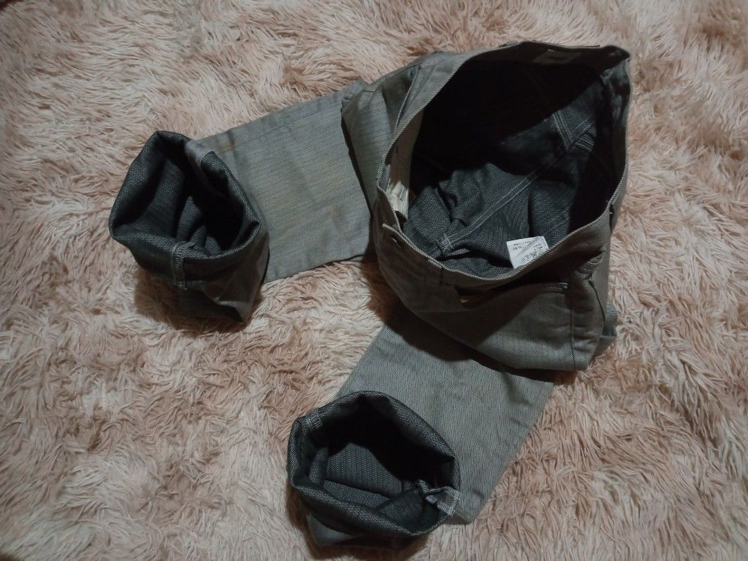 Takeo Kikuchi Herringbone Pattern Pants Size 2 (Category: Jeans) located in Boston. Submitted by johnpaulvi30029 (Listing ID 1467999151, Image 2). Description: Takeo Kikuchi gray trousers with a distinct herringbone weave pattern throughout. Size 2 on the inner waist label. Button fly closure, front pockets, and rear patch pockets. Straight leg cut. Clean interior lining with Japanese care tags. Neutral tone works easily with various tops..