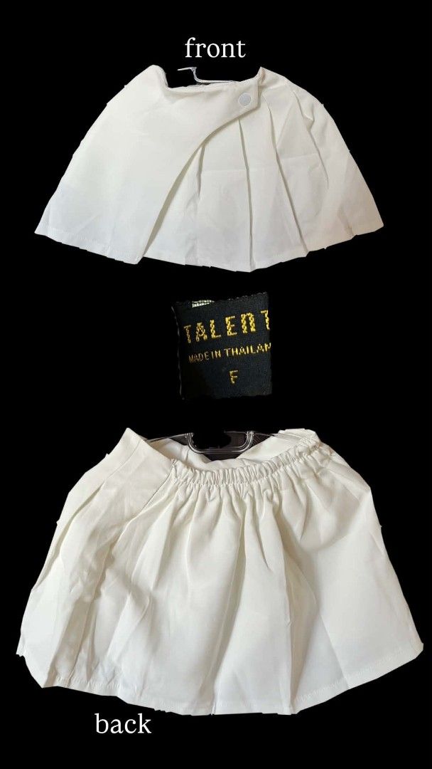 Talent / Prompt Skort (Category: Skirts) located in Marikina City. Submitted by savemyclosetph (Listing ID 1467945799, Image 1). Description: Set of three skorts in white, light blue, and black. Made in Thailand by Talent and Prompt. Free size with elastic waistband on the back. Front flap design with decorative buttons and pocket flaps. Pleated front look. Material is lightweight and smooth. Unworn condition with original tags attached. Size: Sm