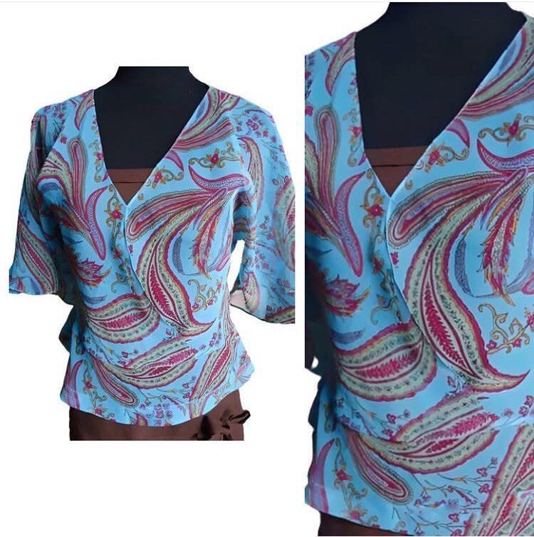 TEAL BLUE PAISLEY CHIFFON BLOUSE (Category: Blouses) located in Marikina City. Submitted by minimalistmanila (Listing ID 1467870692, Image 2). Description: Teal blue paisley chiffon blouse. Can be used as a swimsuit cover up too. Medium. Order now! .