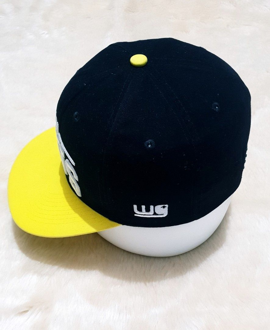 Team Jesus Snapback Cap Black Yellow (Category: Caps & Hats) located in Taguig. Submitted by wethrifting2021 (Listing ID 1468013901, Image 2). Description: - Color: Black cap with vibrant yellow brim and top button - Design: Bold embroidered "Team Jesus" text on the front and small logo on the side - Fit: Structured crown with adjustable snapback closure for a custom fit - Comfort: Built-in stitched eyelets for breathability - Condition: Brand ne