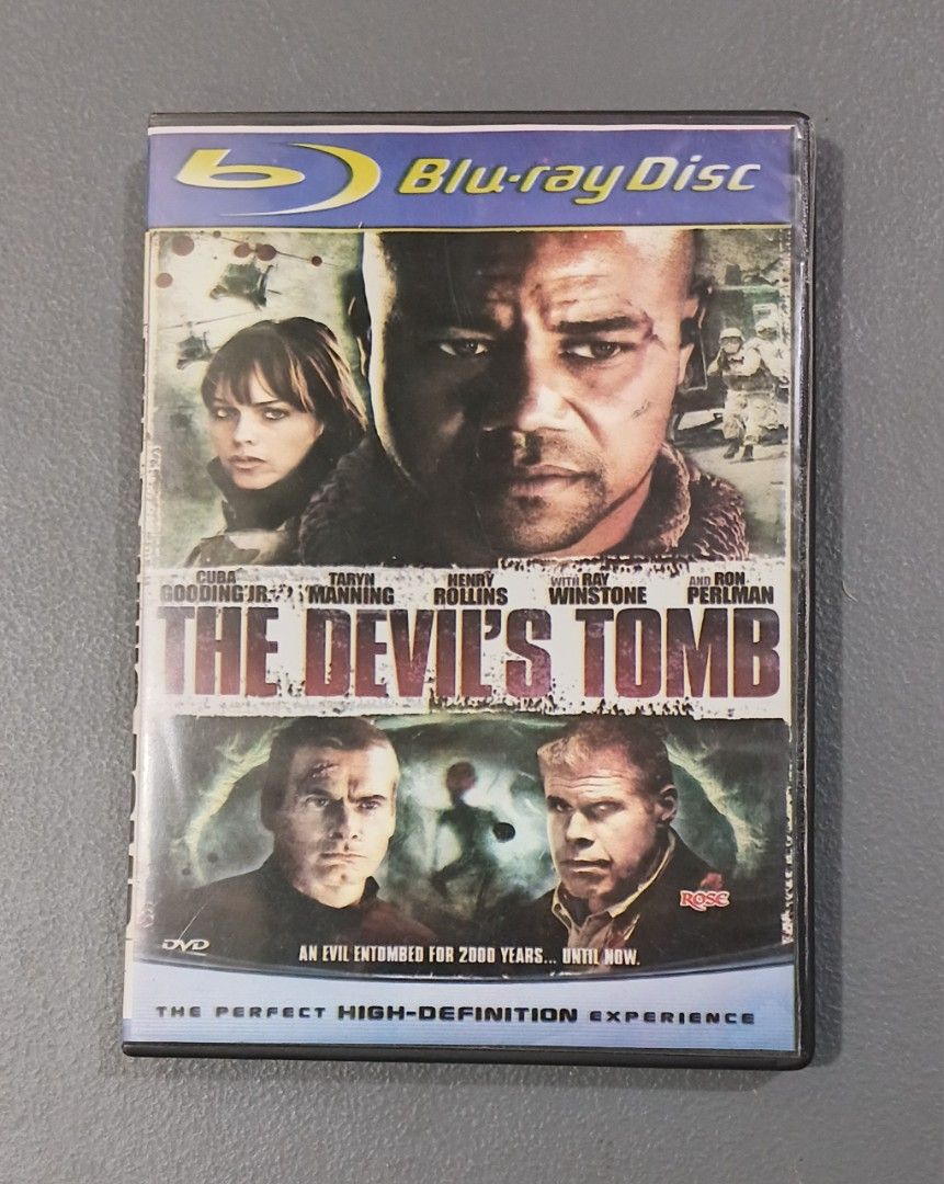 The Devil's Tomb Blu-ray Copy DVD (Category: CDs & DVDs) located in Bulacan. Submitted by honhonliz (Listing ID 1467931733, Image 1). Description: - Title: The Devil's Tomb (Blu-ray) - Genre: Action Horror - Cast: Cuba Gooding Jr., Taryn Manning, Henry Rollins, Ron Perlman - Director: Jason Connery - Inclusions: Case and disc included as pictured - Condition: Great addition for movie night - Note: Check back cover artwork for region and playback 