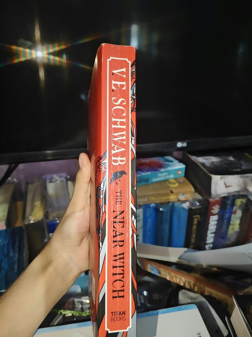 The Near Witch by V.E. Schwab (Category: Storybooks) located in Manila. Submitted by soleilmirai (Listing ID 1467861468, Image 3). Description: - Atmospheric debut dark fairy tale novel by #1 New York Times bestselling author V.E. Schwab (The Invisible Life of Addie LaRue) - Official UK trade paperback edition (Titan Books, featuring an introduction by the author and bonus short story "The Ash-Born Boy") - Follows sixteen-year-old Lexi in a lonel