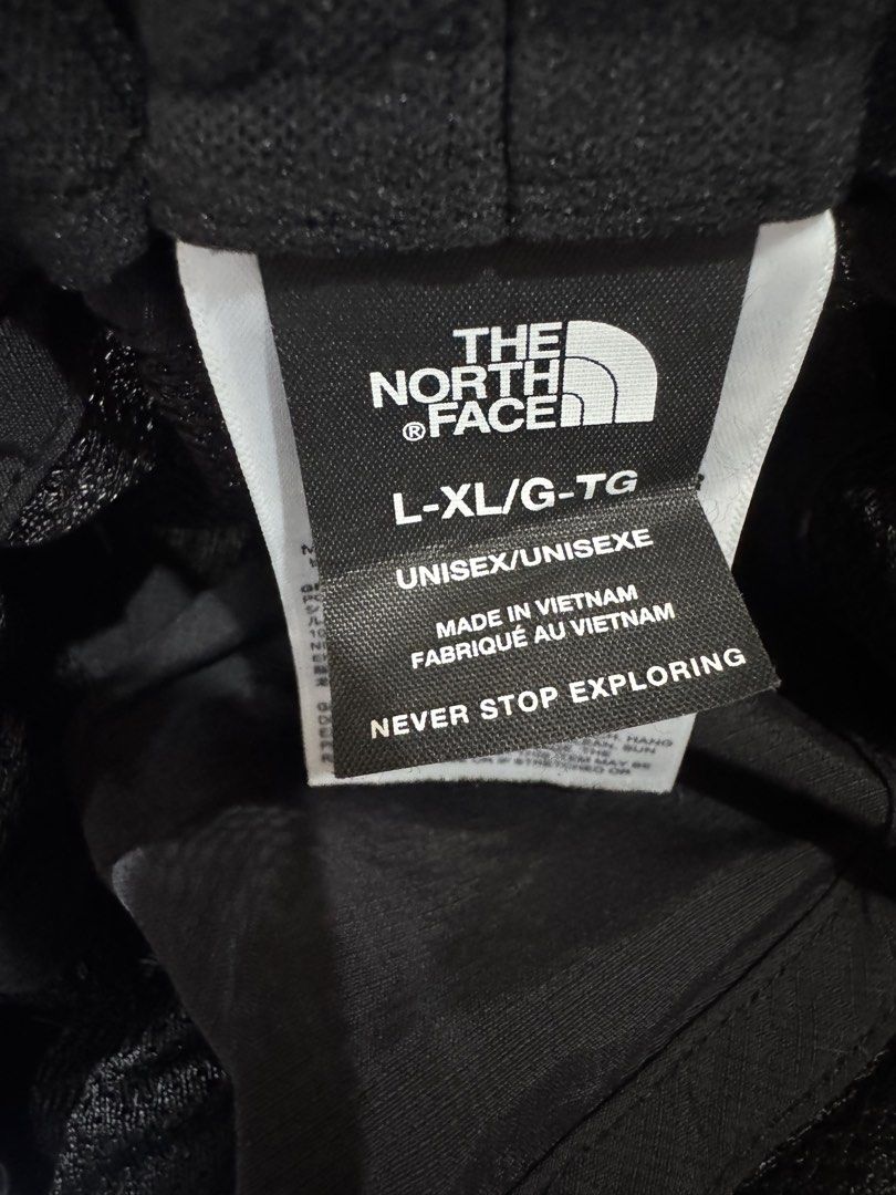 The North Face 100% Original (Category: Caps & Hats) located in Manila. Submitted by wildbear.e10374 (Listing ID 1467872097, Image 2). Description: - Brand: Authentic The North Face - Color: Black with white logo embroidery - Size: L-XL (Unisex fit) - Features: Wide brim style & adjustable chin strap - Origin: Made in Vietnam - Condition: Clean inside and out, excellent pre-loved condition this item is 100% Original..