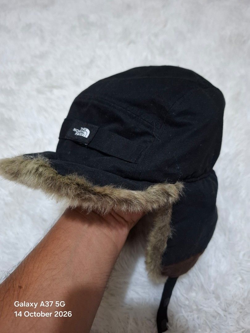 The North Face Frontier Cap (Category: Caps & Hats) located in Manila. Submitted by thriftfinds_tagum (Listing ID 1468016023, Image 1). Description: The North Face Frontier Cap Excellent condition one size Adult with ear flap ideal for cold weather conditions Adjustable strap with front patch logo no issue 550.⁰⁰.