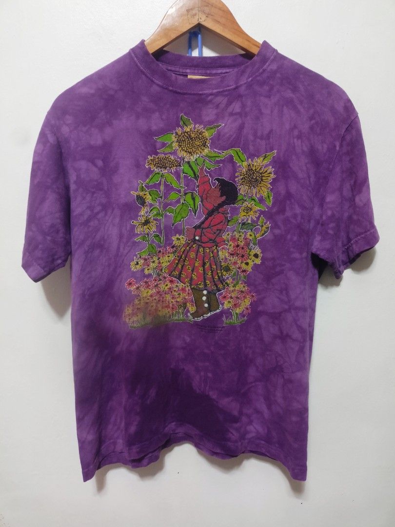 This vintage The Mountain (Category: Shirts) located in Rizal. Submitted by daddyjayofficialph (Listing ID 1467844680, Image 2). Description: This vintage purple tie-dye t-shirt features artwork by Lydia Dillion-Sutton, produced by The Mountain around 1996. Size: XL on Tag. dimes 20x25..