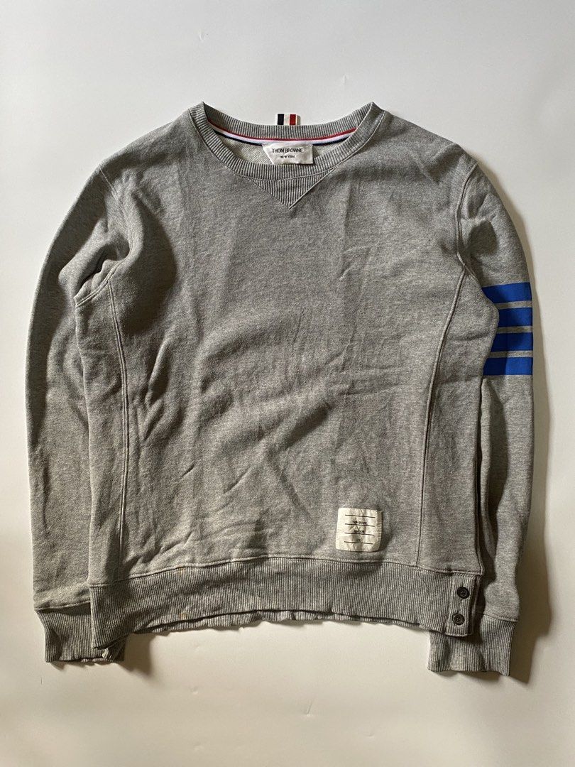 Thom Browne x Colette Grey Sweatshirt (Category: Coats, Jackets and Outerwear) located in Manila. Submitted by finofindthisart (Listing ID 1467950926, Image 2). Description: Length 24 Width 21 Measured it by inches Issue: N/A This is a pre-loved/thrifted items and may show minor signs of issue due to its vintage nature. Kindly manage expectations. No refunds or exchanges will be accepted. 📍Pasay City DM for inquiries..