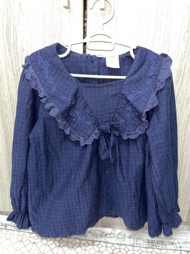 Tiny Button Embroidered Blouse (Category: Babies & Kids Fashion) located in Parit Buntar. Submitted by 27082017 (Listing ID 1467922955, Image 1). Description: 🦋 Blouse with round neckline 🦋 Long sleeves with elasticated cuff 🦋 Button fastening at the back 🦋 Suitable for aged 6-7 years.