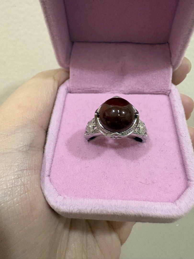 Titanium Ring with Red Cabochon Stone Vintage style (Category: Rings) located in Manila. Submitted by alyannaros79007 (Listing ID 1467982220, Image 2). Description: - Stunning statement ring with a large domed red center stone - Intricate filigree detailing along the silver band - Vintage-inspired design with a bold, eye-catching look - Perfect for gifting or adding a touch of retro elegance to any outfit.