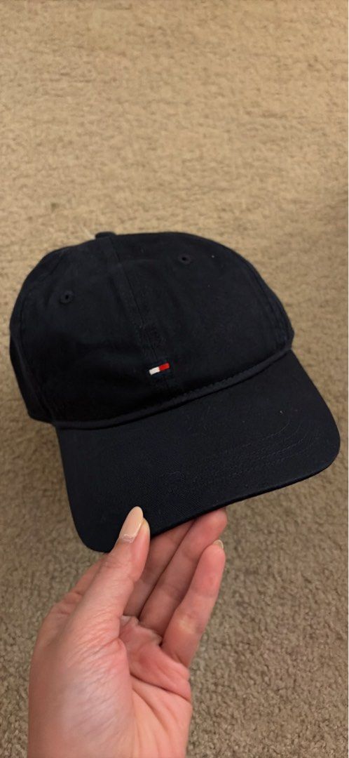 Tommy Hilfiger Soft 6 Panel Cap Space Blue (Category: Caps & Hats) located in Marikina City. Submitted by __juliaselects (Listing ID 1467897556, Image 1). Description: - Brand: Tommy Hilfiger - Condition: Brand new with original store tags - Color: Space Blue - Design: Classic 6-panel baseball hat with small embroidered flag logo on the front - Fit: One size fits most with an adjustable strap in the back - Guaranteed authentic, from AUS.