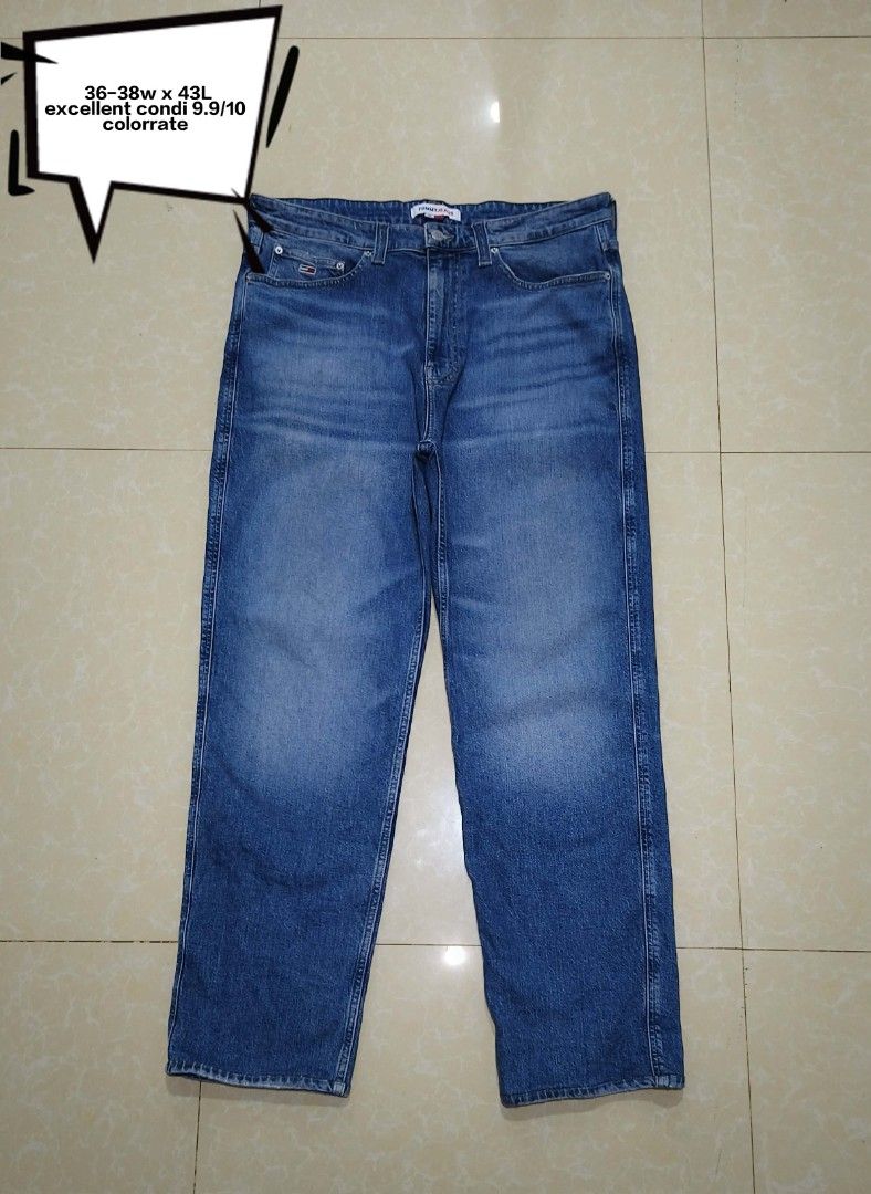 Tommy Jeans Blue Denim Pants (Category: Jeans) located in Manila. Submitted by purefire-477a (Listing ID 1467851467, Image 1). Description: - Brand: Tommy Jeans - Style: Classic straight leg denim pants - Color/Wash: Versatile medium blue wash with light fading - Details: Signature logo patch on back waistband, small flag branding on coin and back pockets - Features: Traditional five-pocket styling and button fly - Condition: Excellent quality, r
