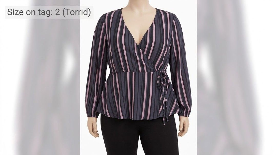 Torrid Striped V-Neck Wrap Peplum Blouse Size 2 (Category: Blouses) located in Makati City. Submitted by grande.taille.by.ab (Listing ID 1467967378, Image 1). Description: - Brand/Style: Torrid striped wrap blouse - Color: Dark grey and pink - Size: Plus Size 2 - Details: V-neckline, long sleeves with banded cuffs, side tie waist, peplum hem - Material: Lightweight with a soft drape - Versatility: Great for workwear or casual weekends.