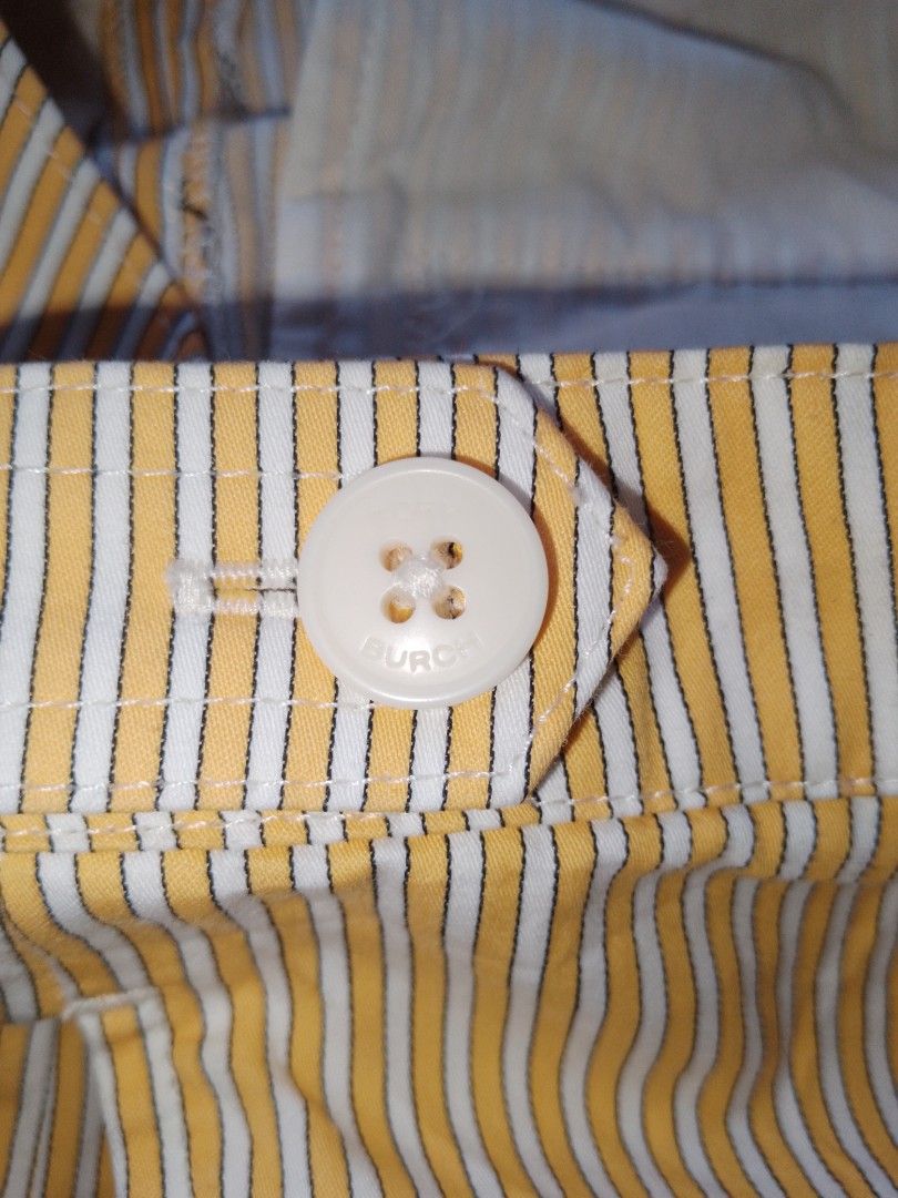 Tory Burch Yellow Pinstripe Shorts (Category: Shorts) located in Cagayan de Oro. Submitted by august.colms (Listing ID 1467901885, Image 3). Description: - Brand: Tory Burch - Size: 0 - Color: Yellow and white pinstripes - Material: 100% cotton - Design: Pleated front with white branded button closure - Care: Dry clean only - Origin: Made in the Philippines - Style: Casual summer wear with a great fit.