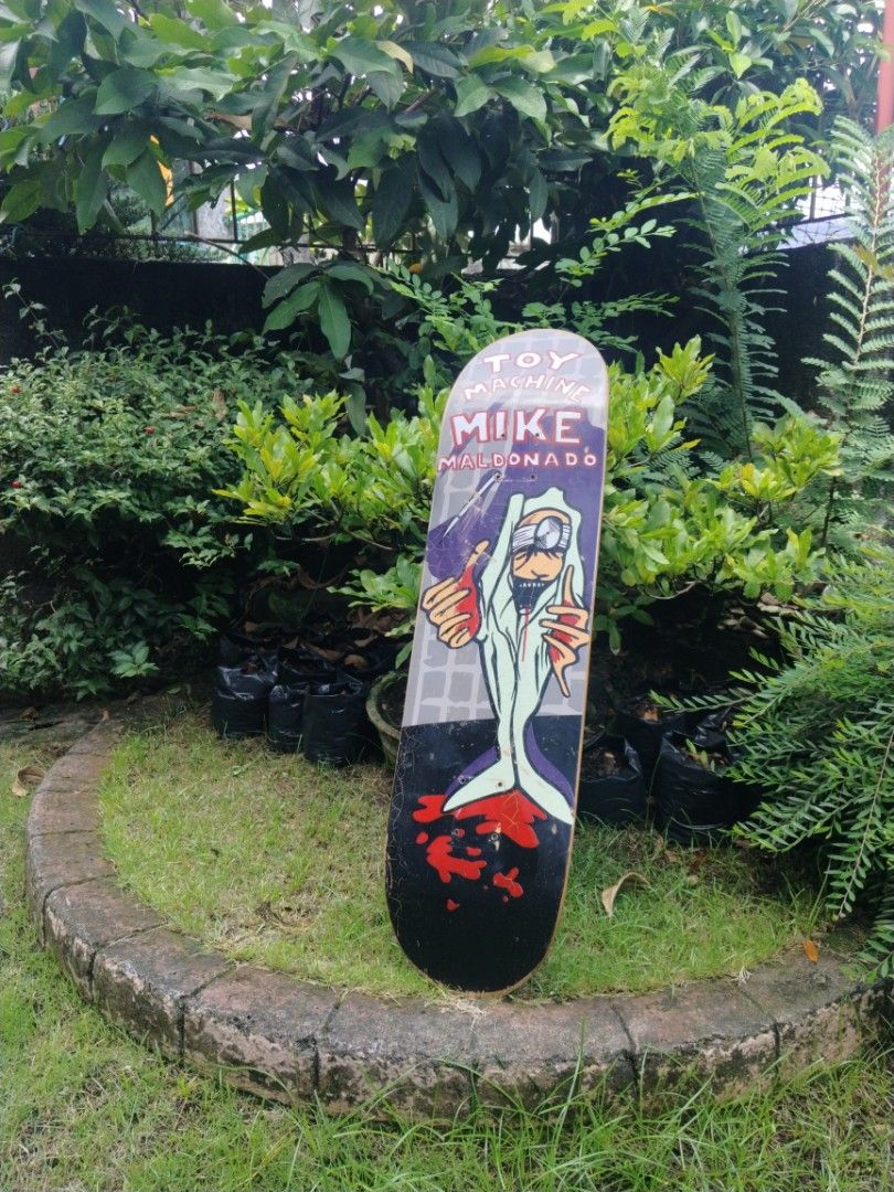Toy Machine Mike Maldonado vintage Deck (Category: Skates, Rollerblades & Scooters) located in Legazpi City. Submitted by genobecollectives (Listing ID 1467981339, Image 1). Description: Toy Machine signature by Mike Maldonado 98-99 deck 10,000 - Design: Purple/grey doctor character with bloody items, black tail with red blood splatter - Condition: Minor surface cracking on graphic and light edge wear from previous setup - Setup: Pre-drilled truc
