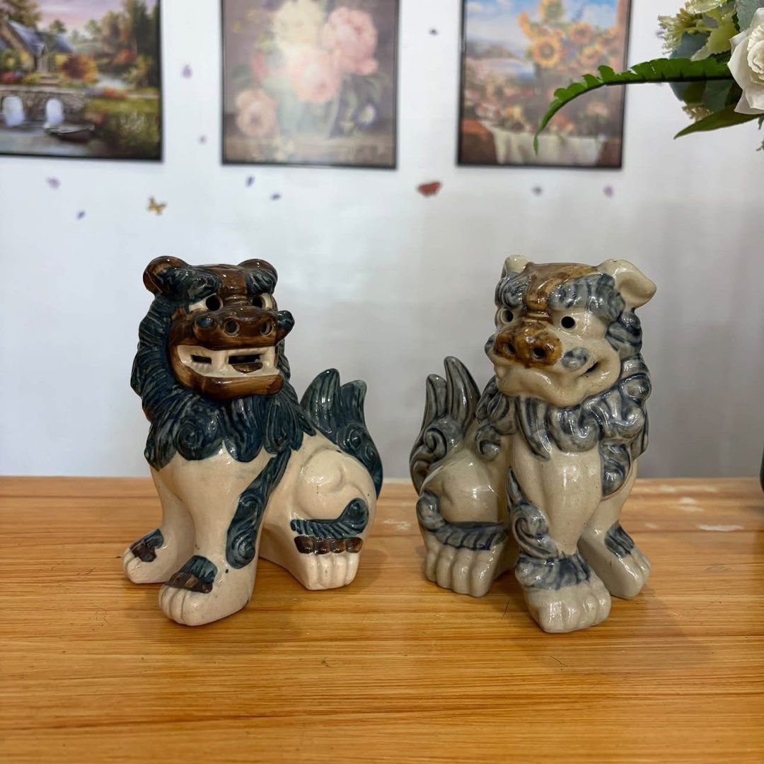 TRADITIONAL SHISA LION-DOG ✨ (Category: Vintage Collectibles) located in Bustos. Submitted by gthings.collectibles (Listing ID 1467932696, Image 2). Description: TRADITIONAL SHISA LION-DOG ✨ It is used as a protective talismans toward off evil and invite good fortune into a home ✨ They are placed on rooftops, gates, and inside homes to protect the household from misfortune. 🦁🧧 • The Right Statue (Open Mouth): This is traditionally the male. He 