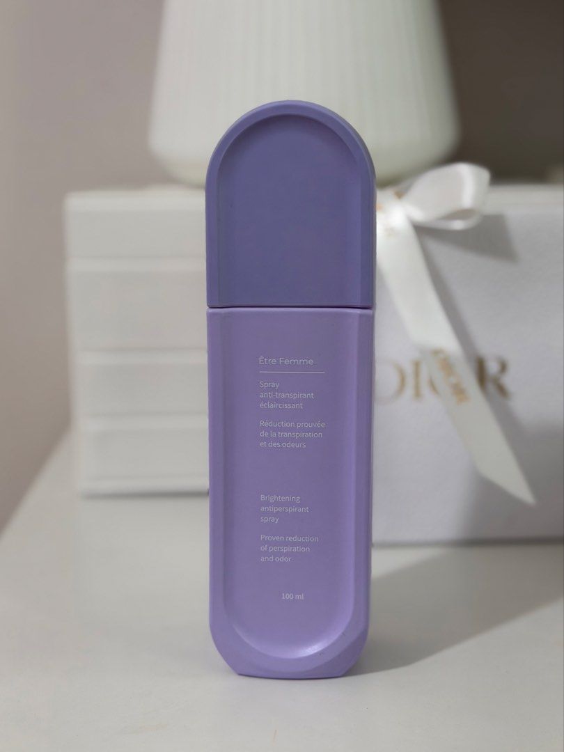 Être Femme Deodorant Spray (Category: Fragrance & Deodorants) located in Mandaluyong City. Submitted by notmichaela (Listing ID 1467909258, Image 1). Description: 90% full - Brand/Product: Être Femme Brightening Antiperspirant Spray - Size: 100ml (Purple packaging) - Benefits: Controls perspiration, eliminates odor, and helps brighten skin - Key Ingredients: Tomato fruit extract and alpha arbutin - Formula: Alcohol-free and cruelty-free - Manufac