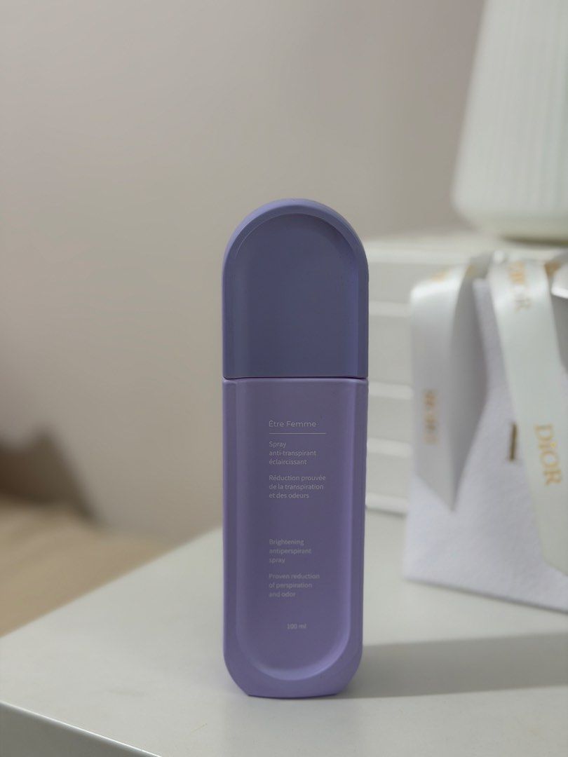 Être Femme Deodorant Spray (Category: Fragrance & Deodorants) located in Mandaluyong City. Submitted by notmichaela (Listing ID 1467909258, Image 3). Description: 90% full - Brand/Product: Être Femme Brightening Antiperspirant Spray - Size: 100ml (Purple packaging) - Benefits: Controls perspiration, eliminates odor, and helps brighten skin - Key Ingredients: Tomato fruit extract and alpha arbutin - Formula: Alcohol-free and cruelty-free - Manufac