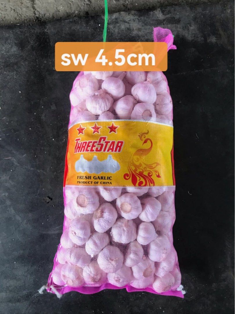 Triple Star Fresh Garlic 5cm Mesh Bag (Category: Fresh Produce) located in Paranaque City. Submitted by our_daily_essentialz (Listing ID 1467909337, Image 3). Description: - Brand: Triple Star - Origin: China - Bulb Size: 5cm - Packaging: Purple net bag with secure ties - Condition: Fresh whole garlic heads - Best for: Cooking and seasoning daily dishes.