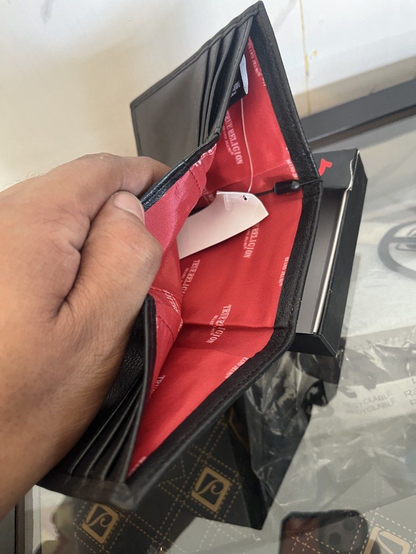True Religion Wallet /Black (Category: Wallets & Card Holders) located in Camalaniugan. Submitted by anarchymonopoly052128 (Listing ID 1467866253, Image 2). Description: .