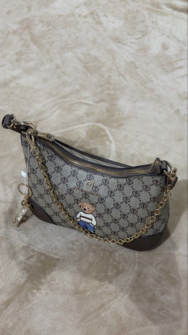 TTWN & Bear Brown Monogram Shoulder Bag with Teddy Bear Patch (Category: Shoulder Bags) located in Manila. Submitted by declutterwithesca (Listing ID 1468028641, Image 1). Description: - Bought in Malaysia - New.
