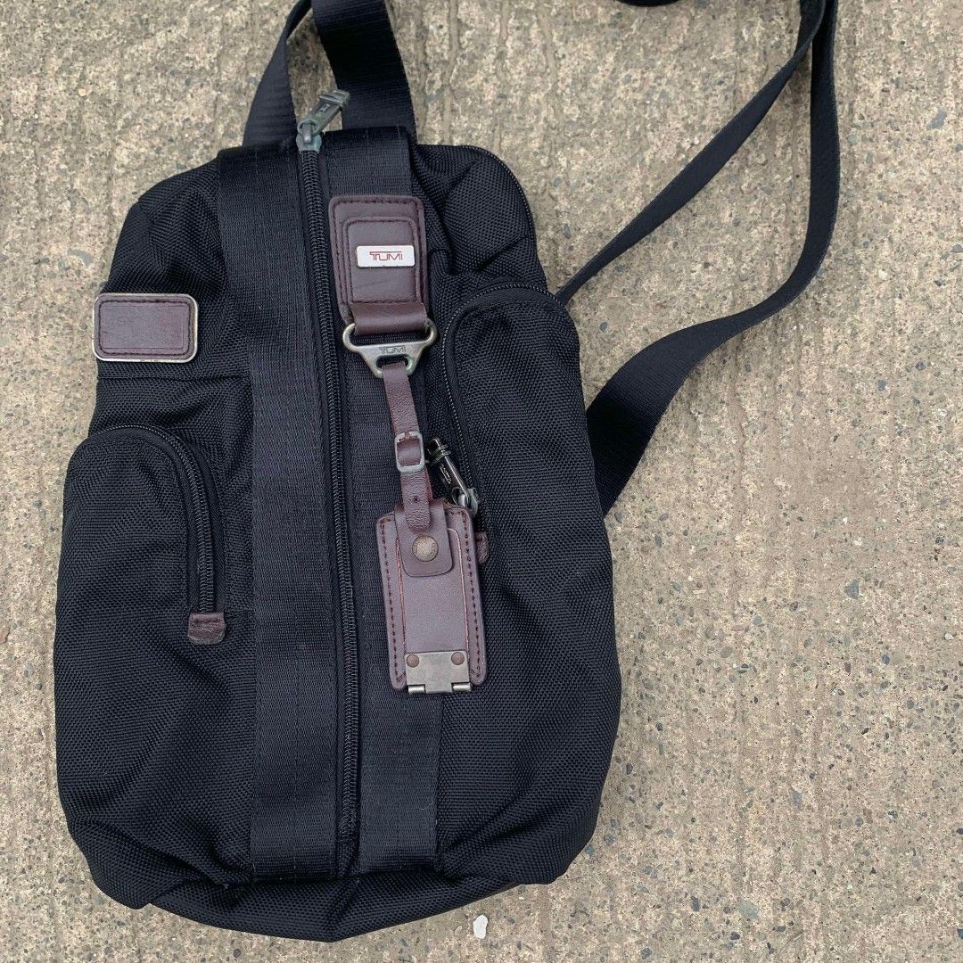 TUMI BODY BAG (Category: Sling Bags) located in Cagayan de Oro. Submitted by mysticdolphin.62c23a (Listing ID 1467918915, Image 2). Description: TUMI CROSS BODY BAG GOODASNEW BLACK NA BLACK NO ISSUE.