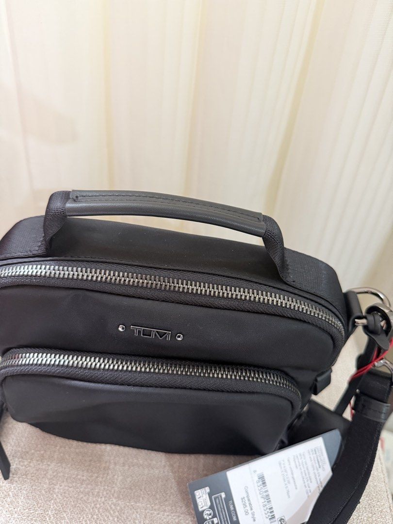 Tumi Tammy gunmetal hardware (Category: Luxury Bags & Wallets) located in Legazpi City. Submitted by thebagbragbyjojo (Listing ID 1468005260, Image 2). Description: Onhand in ph! 100% from USA. NOT FAKE NOT FAKE NOT FAKE. with tag and paper bag🩷.