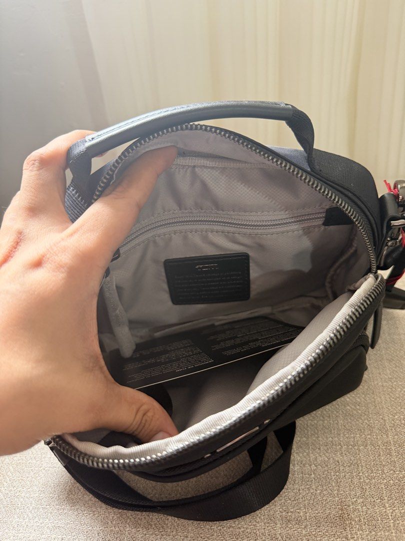 Tumi Tammy gunmetal hardware (Category: Luxury Bags & Wallets) located in Legazpi City. Submitted by thebagbragbyjojo (Listing ID 1468005260, Image 3). Description: Onhand in ph! 100% from USA. NOT FAKE NOT FAKE NOT FAKE. with tag and paper bag🩷.