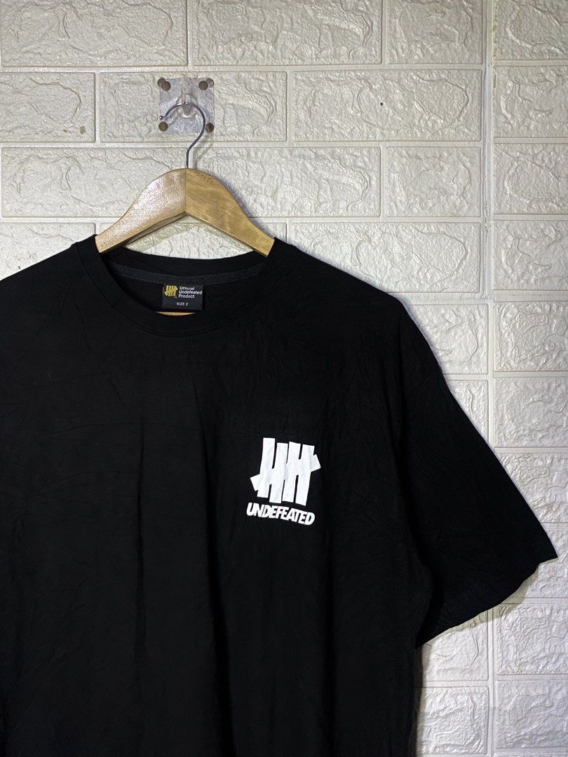 Undefeated Icon Logo T-Shirt (Category: Tshirts & Polo Shirts ) located in Davao. Submitted by vanthriftfinds5 (Listing ID 1467857832, Image 3). Description: 📌No Issue 📌Excellent condition 📌Size” 2 on tag •Length: 29 •Width: 22 📌Color Rate 9.9/10 DM TO PURCHASE.📩 🏙️ Location: Davao City 8000.