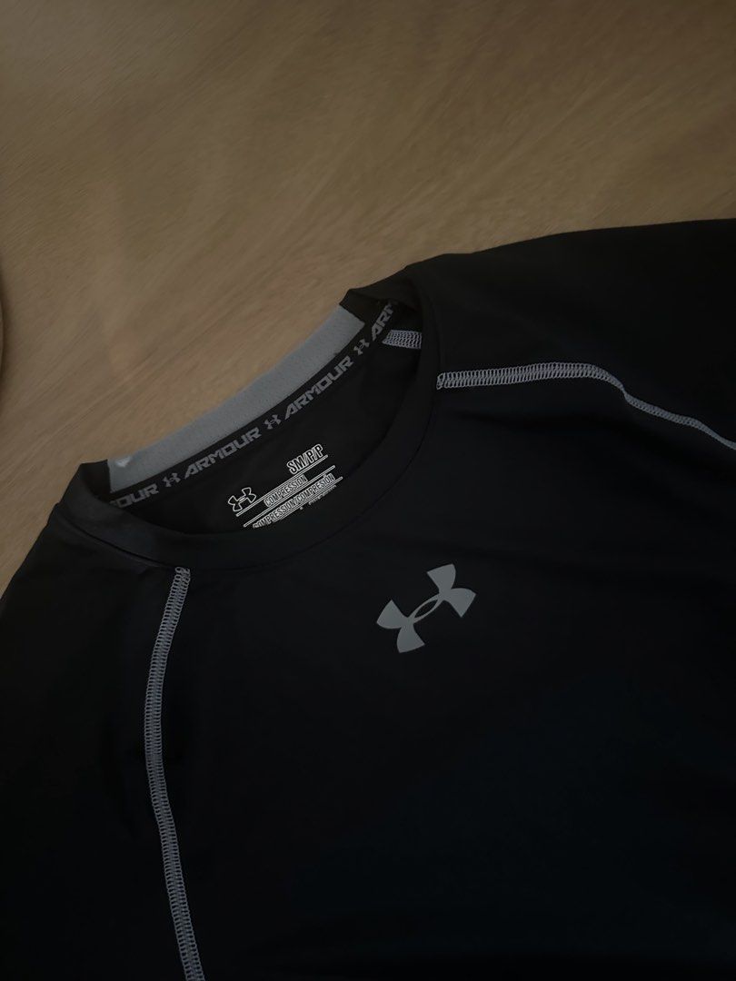 Under Armour Black Compression Shirt (Category: Activewear) located in Paranaque City. Submitted by nobaddays.co (Listing ID 1467897360, Image 1). Description: .