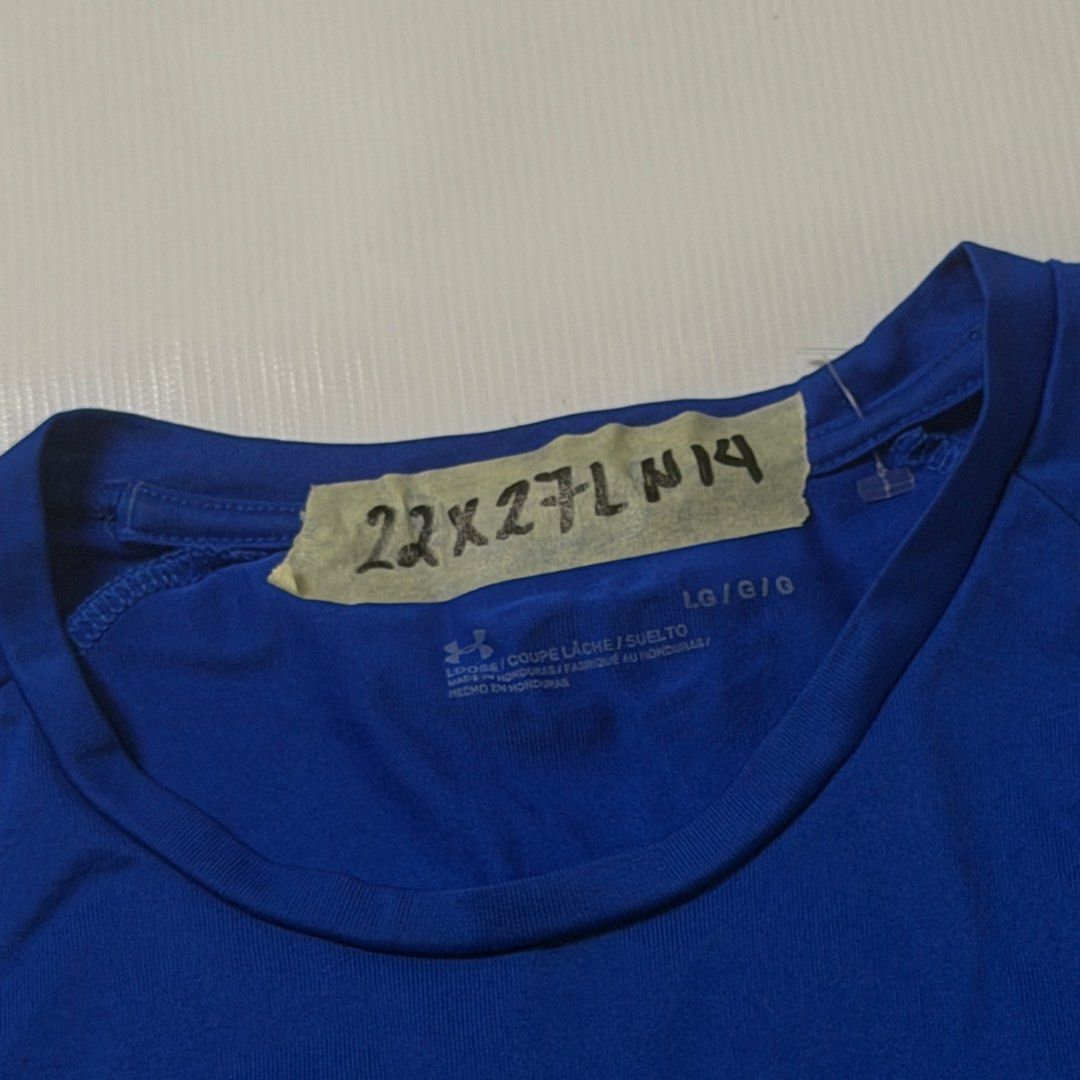 Under Armour Blue T-Shirt Large (Category: Tshirts & Polo Shirts ) located in Gapan. Submitted by rasthriftshop17 (Listing ID 1467994269, Image 3). Description: Size on tag: L Dimes: 22 x 27 Condition: Excellent Color rate: 9/10 Issue: hairlines.