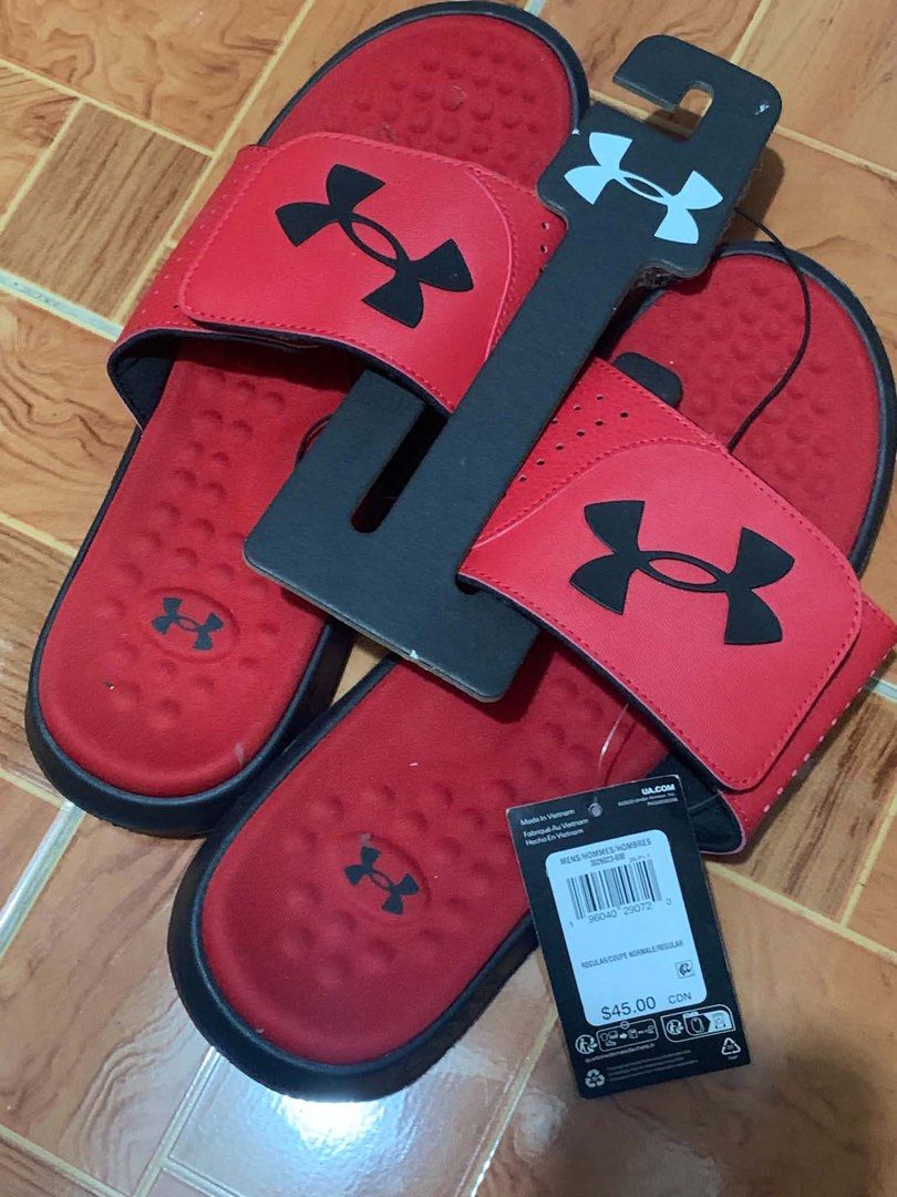 Under Armour Ignite Pro SL Red Black Slides US 10 (Category: Slippers & Slides) located in Las Pinas. Submitted by oddbear_162208 (Listing ID 1467852233, Image 1). Description: - Brand: Under Armour - Model: Ignite Pro SL Slides - Color: Red and Black - Size: US 10 / UK 9 / EUR 44 / CM 28 - Condition: Brand new with tags (BNWT) and original store hanger - Design: Adjustable top strap with large black logo - Comfort: Cushioned footbed with texture