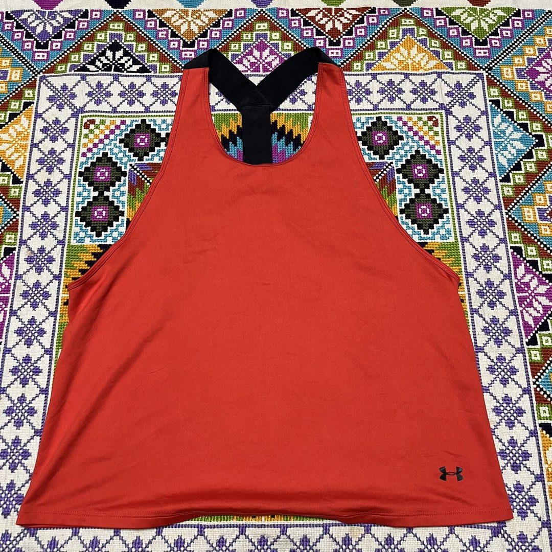 Under Armour Red Athletic Tank Top Racerback (Category: Activewear) located in Dagupan City. Submitted by vernzkee (Listing ID 1467864170, Image 1). Description: - Brand: Under Armour - Color: Bright red with contrasting black crisscross straps - Size/Fit: Measures 18.5 inches across the chest, lightweight and stretchy - Features: Small black UA logo near the bottom hem Fits M-L Location: Dagupan City, Pangasinan MOP: Gcash, Gotyme, Maya, BDO, BP