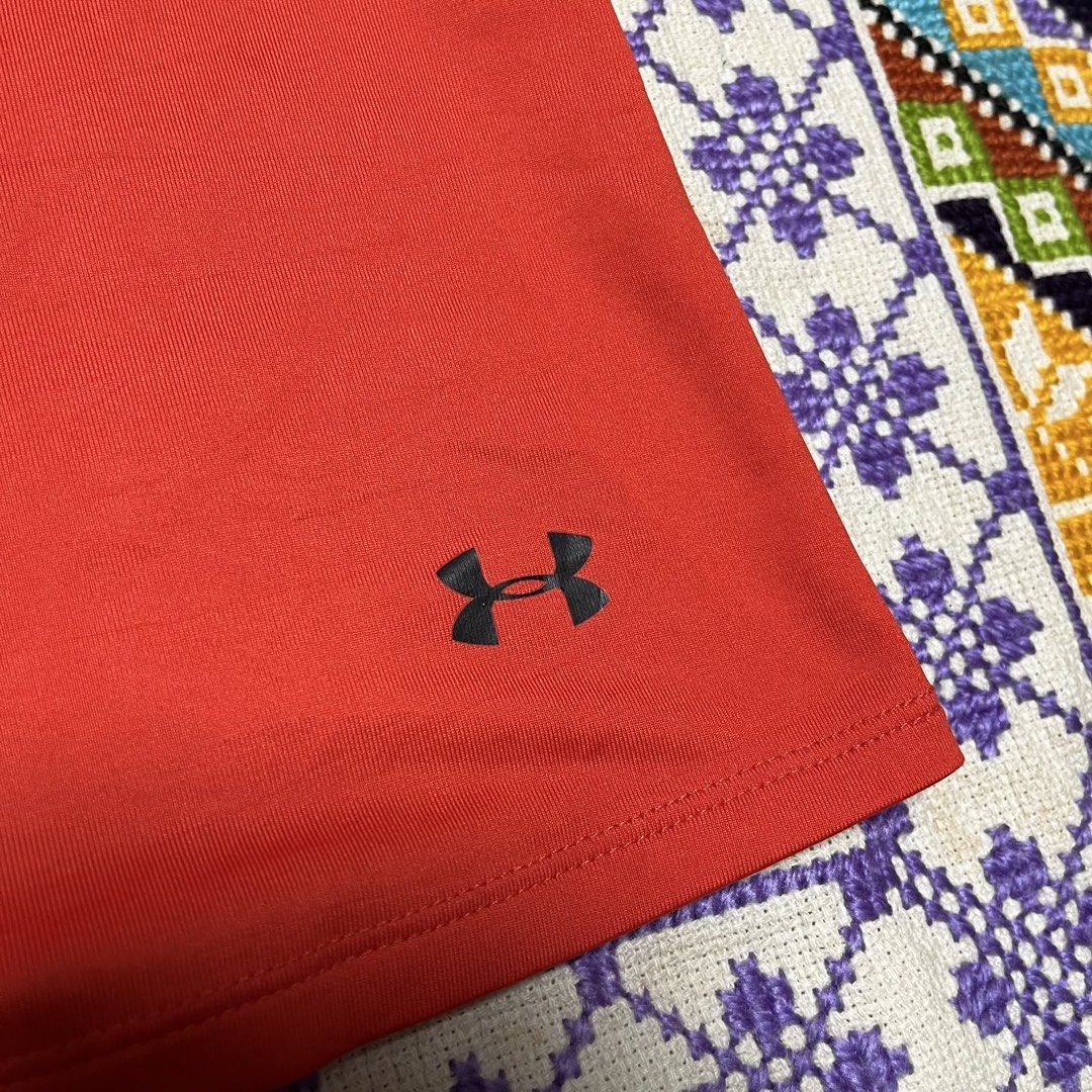 Under Armour Red Athletic Tank Top Racerback (Category: Activewear) located in Dagupan City. Submitted by vernzkee (Listing ID 1467864170, Image 2). Description: - Brand: Under Armour - Color: Bright red with contrasting black crisscross straps - Size/Fit: Measures 18.5 inches across the chest, lightweight and stretchy - Features: Small black UA logo near the bottom hem Fits M-L Location: Dagupan City, Pangasinan MOP: Gcash, Gotyme, Maya, BDO, BP