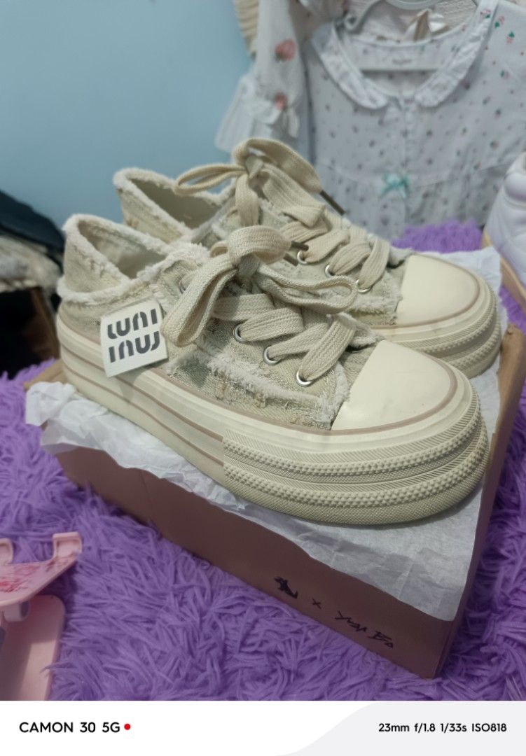 Unicus Casual Platform Sneakers Beige Canvas (Category: Sneakers) located in Manila. Submitted by cleverearth.ed94b6 (Listing ID 1467999787, Image 1). Description: - Style: Beige canvas platform sneakers with chunky rubber soles - Details: Trendy frayed edges for a distressed look, thick laces tied in a bow, and signature side logo tag - Condition: Brand new, worn once only, clean, minor dirt on sole only - Packaging: Includes original branded bo