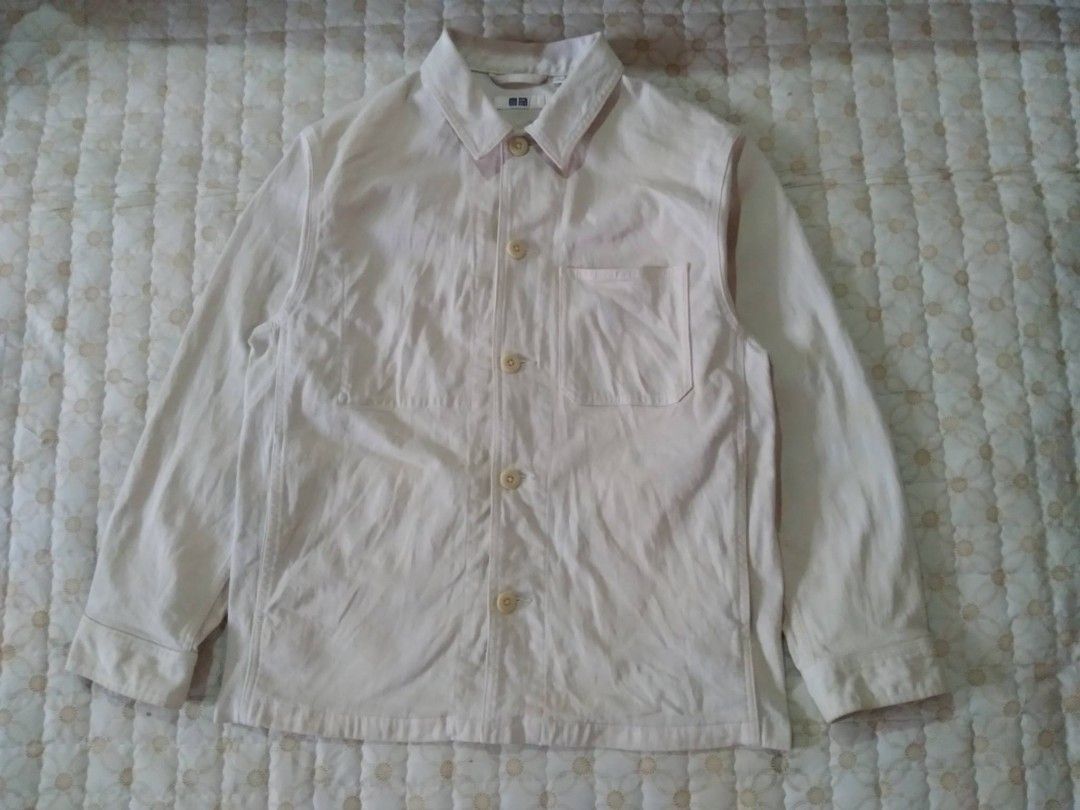 Uniqlo Beige Canvas Workwear Jacket (Category: Coats, Jackets and Outerwear) located in Zamboanga. Submitted by nurbya898048 (Listing ID 1468057666, Image 1). Description: Uniqlo canvas work jacket in off-white. Size M, made in Bangladesh. Classic utility style with front button closure, chest pocket, and side pockets. Durable cotton fabric layer. Clean design, easy to throw on over a t-shirt or hoodie for daily wear. Great transitional piece. Di