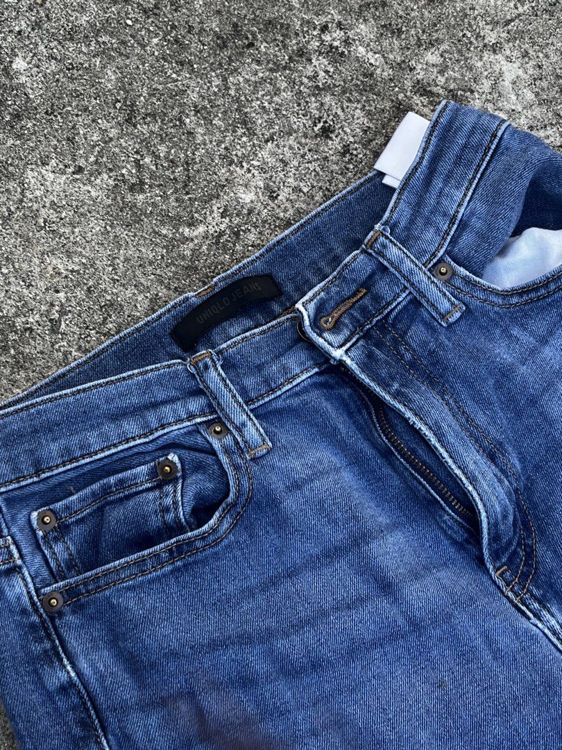 Uniqlo Jeans Distressed Blue Denim (Category: Jeans) located in San Fernando. Submitted by angelhave_wings (Listing ID 1468058434, Image 3). Description: - Brand: Uniqlo - Color: Classic mid blue wash - Fit: Mid-rise with standard belt loops - Material: Cotton and spandex blend for comfortable stretch - Details: Distressed knees with cool ripped spots - Style: Classic five-pocket design with zip fly - Condition: Well-maintained and ready to wear.