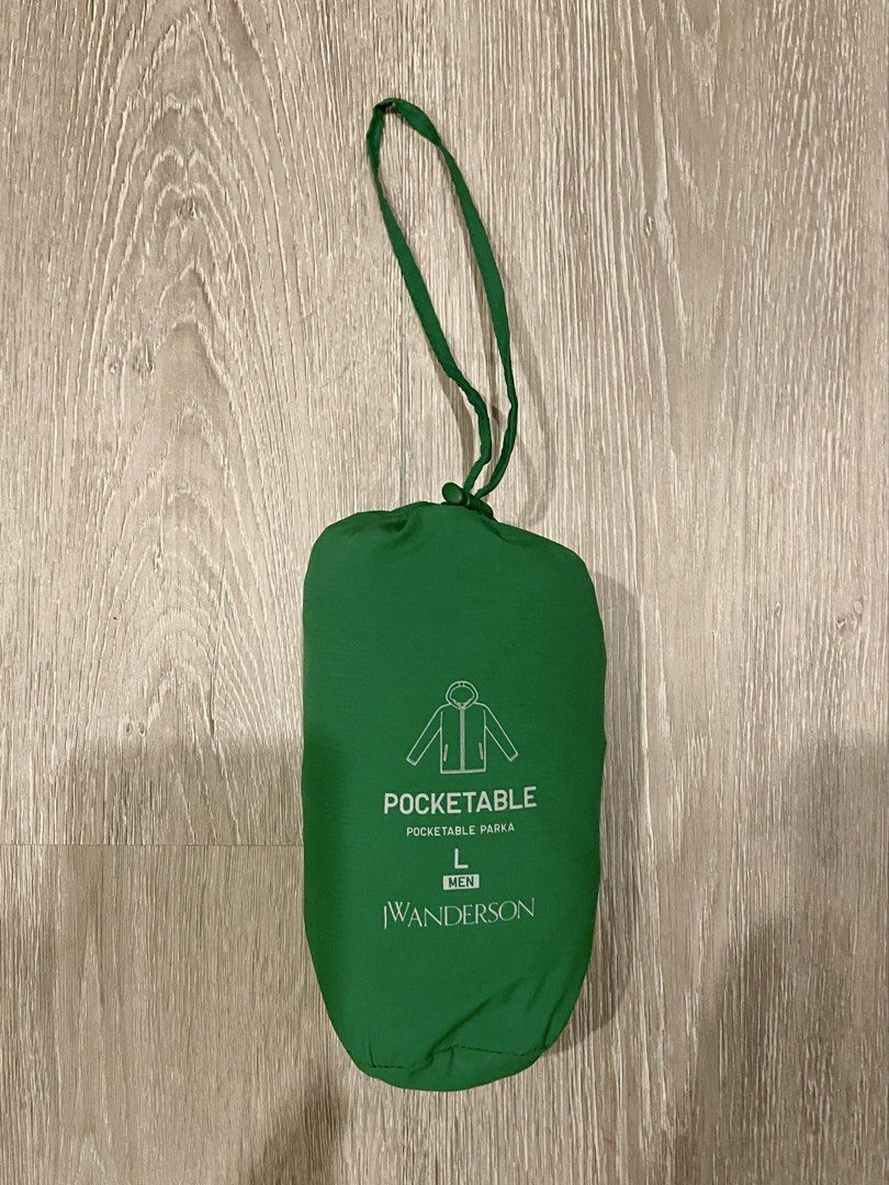 Uniqlo JWA UV Pocketable Parka (Category: Coats, Jackets and Outerwear) located in Marikina City. Submitted by menggufinds (Listing ID 1467983833, Image 3). Description: For Sale: Uniqlo x JW Anderson UV pocketable parka Color: Green Issues: small dark stain and jwa logo peeling, but still fully functional Size: large Dimensions: L: 27in W:22in.
